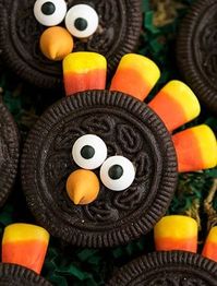 Quick and easy turkey cookies, made with simple ingredients like Oreos and candy corn. These Thanksgiving cookies are fun to make with kids. I have been making these simple turkey cookies with my son and all the other little kids in the family for a few years. It's become a family tradition for Thanksgiving. If you are fond of turkey treats, be sure to check out this Turkey Cake and this Turkey Cake Topper. These Oreo turkey cookies with candy corn are great for kids! These easy turkey cookies