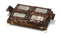 A GEORGE IV TORTOISESHELL, IVORY AND MOTHER-OF-PEARL GAMES BOX CIRCA 1825, POSSIBLY GERMAN The rectangular base with scroll handles with four small removeable rectangular boxes, the hinged lids inlaid with pagodas in landscapes, birds and musical instruments framed within a foliate border, opening to reveal coloured ivory counters, on bun feet 1¾ in. (4.5 cm.) high; 9 in. (23 cm.) wide; 5½ in.(14 cm.) deep