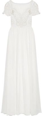 Alice Temperley admits she loves designing bridal collections for Temperley London - her pieces allow the wearer to be the best version of herself. Made from tulle and silk-chiffon, this partially lined gown has an intricately hand-beaded, crocheted bodice that falls to a pleated, floor-sweeping skirt. Style your hair in a low chignon to highlight the open back.#bohowedding #bohemianweddingdress #bohemianwedding #beautiful #afflink #boho #fashion #gorgeous