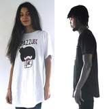 Urban rounded long t-shirt 100% Cotton Made in Italy, with big logo printed at the center chest. Round neck. Oversized fit. DETAILS Measurements: Material: 100% Cotton Garment Care: 40 degrees machine wash. Do not iron on logo.