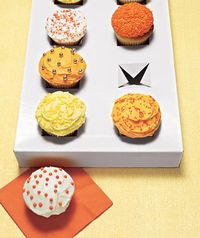 Cut X's into gift box to make disposable cupcake carrier.