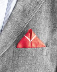 Repurpose vintage scarves as pocket squares to give the guys a wee bit of the style spotlight. You could even include a mini manual for how to fold them.