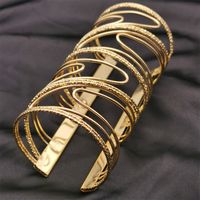 Golden Curves Hair Cuff Hair Cuff for Locs, Sisterlocks, Dreadlocks Shape\pattern: Round Setting Type: Tension Setting Plating: Gold-color Material: Copper alloy, Rhinestone, Natural stone, Hollow out Function: Mood Tracker Compatibility: All Compatible Color: Golden, Gold laminated