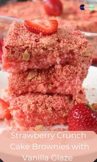 Strawberry crunch cake brownies made easy with store-bought cake mix. Then topped with a simple vanilla glaze, and cookie and strawberry crumble. #recipe #cake #strawberry #vanilla #glaze #crumble