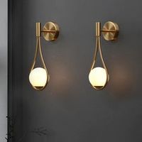 Specs Hardwired Wall Sconce Voltage: 90V - 260V fits all voltages (USA, AUSTRALIA, EUROPE) Measures: 9.4" Height x 6.3" Width x 4.9" Depth (40cm x 16cm x 12.5cm) Bulb Diameter: 4.7" (12cm) Power Source: AC Lamp Socket: G9 Lighting Area: 5 - 10 square meters Material: Iron LED bulb light source CLC, CLCP, CFLC Certified European Lighting Standard EN12464-1 If you have any questions regarding our service or products please don't hesitate to contact us! Our lamps can be installed all ar