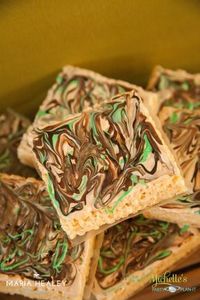 Add purple icing to match purple camo theme. - Camouflage Rice Krispie Treats
