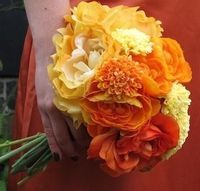 Orange wedding bouquet | DIY Bouquet | Trim stems down to desired length, bundle together, and finish with floral tape and ribbon.