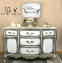 Limestone, Smokey Quartz and Modern Masters Warm Silver. Inside is robins Egg. Metallic Bronze glaze.