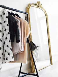 Only keep a certain number of hangers, when you run out, you know it's time to get rid of some clothes.