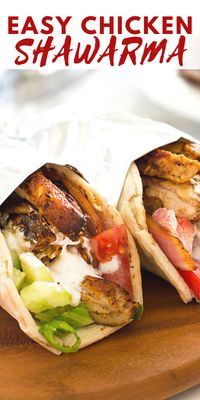 Easy Chicken Shawarma with tender, smokey and flavorful chicken and a salty, garlic and lemon yogurt sauce served over crisp veggies and warm pita bread.