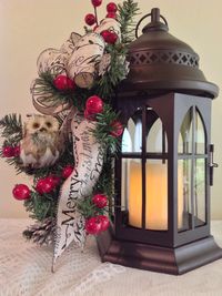 Metall lantern 4" candle ,owl ,Merry Christmas bow ,red berries , small pine cones . L119. 2016. $65.00. Sold