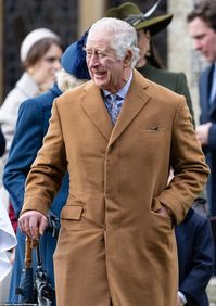 King Charles III laughs as he greets the public in Sandringham on Christmas day, meeting t...