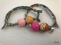 Handpainted wooden bead doll ~ Liberty London and Lecien bracelets