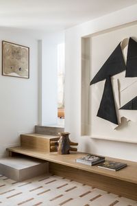 Stair shelving designed by Batiik Studio