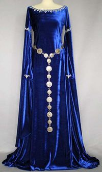 Stunning medieval dress named Camelot, with silver decoration and medieval silverbelt, velvet fabric in magic blue, made by costumedesigner Evelyn Preikschat; found on www.tagtraumkleider.de