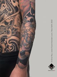 This picture is of lower hand sleeve from a full japanese theme body suit done by Krishna Roy at Frozen Ink And Art studio Delhi, India. This is the first ever full body suit tattoo done in India in year 2022.