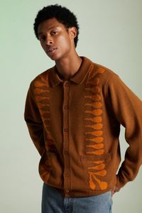 Sweater by OBEY in a classic cardigan style & wool blend knit fabrication. Topped with a pattern and fitted with a button placket to the front. Includes pockets at the waist and finished with a tab collar. Content + Care. 70% Acrylic, 30% wool Hand wash Imported Size + Fit. Model is 6'2.5” and wearing size Medium Measurements taken from size Medium Chest: 24” Length: 27”