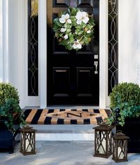 Lifelike magnolia blossoms burst forth from the deep green leaves on the gorgeous Magnolia Wreath. The wreath features magnolias in every stage of growth, from the bulb to the full flower head.