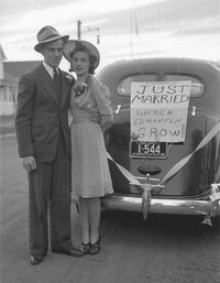 1940 wedding snapshot. 40s found photo street man woman fashion style dress hat suit