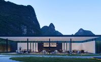 Working hard to compete with the view, architects Co-Direction Design has softened the façade of a pre-existing building with a tableau of garden paths paved with white stones and pergolas, alongside a vast low-hanging pavilion lounge that’s fringed with bamboo and a reflection pool. It’s a beatific spot even in summer as cool mountain air is drawn in through high clerestories.