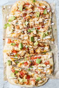 The best homemade flatbread dough recipe with cheese, bacon, chicken and ranch. A simple and delicious lunch idea.
