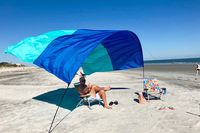 *Quantity limited to 2 per order! About Shibumi Shade is a modern beach shade that works with the wind, not against it. Weighing under 4 pounds, the Shibumi Shade is lightweight enough to be carried to the beach by any member of the family. Set up takes only a few minutes, and you'll have enough shade coverage for the entire group. We make our classic Shibumi Shade in a blue and teal color combination that complements the colors of the ocean and sky.