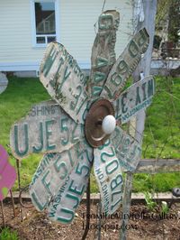Garden flowers made with license plates