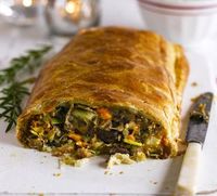This vegetarian main course is packed with festive flavours like nutmeg and cloves, then wrapped in flaky butter pastry - a real Christmas treat