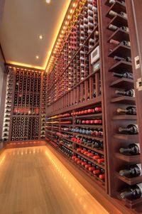 contemporary wine cellar by London Audio Ltd