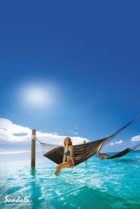 Over-the-water hammocks at Sandals Royal Bahamian add a bit of adventure and a whole lot of relaxation to your vacation. | Sandals Resorts | The Bahamas | Caribbean Resorts | Luxury Travel