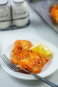 This low carb baked cod recipe is ready in about 15 minutes! So quick and so flavorful! #recipe #seafood #keto