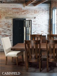 Rustic dining decor gets a sophisticated update with this Chesterton Amish dining room furniture series, showcasing an engaging blend of contemporary and rustic styles and materials.