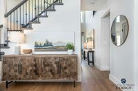 Entryway with Benjamin Moore Edgecomb Gray lightened wood cabinet, Ken Kirkby art. Kylie M INteriors Edesign, online paint color