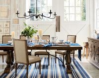 Remember to steer clear of prints except stripes and sea inspired patterns. When looking for upholstery for your chairs, think cream and beige. You can also choose to add metal rivets to your chairs to create visual interest. Image courtesy, Pottery Barn