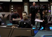 Buzy on the bridge of the Big - E. First Contact, 1996.