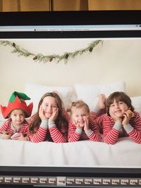 These are my amazing kids! Fun fact: my wife is a photographer, and this photo was taken in our home studio. (This is actually a photo of her computer screen as she was editing the final shots.) The hat wasn't planned... our little guy just refused to take it off! From left to right: Andrew, Chloë, Charlotte, and Aidan.