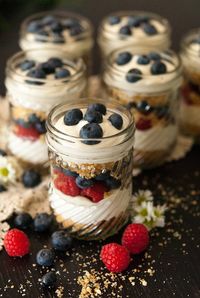 This no-bake vanilla cheesecake mousse is dreamy, creamy and layered with blueberries, raspberries and a scrumptious Nilla Wafer crumble! #cheesecake, #july4thfood, #mousse, #vanillacheesecake, #nobake, #dessert
