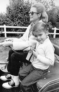 Princess Grace and her daughter, Princess Stephanie. Photo by Howell Conant at Roc Age (the royal family's home/farm)l, 1969.