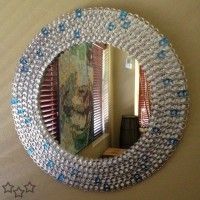 Marco para espejo reciclado con anillas de latas