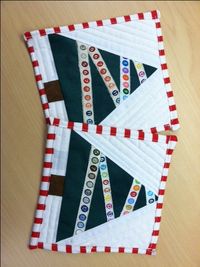 Selvage Christmas Tree mug rugs. Would make cute Easter eggs too.