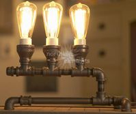 Looking to add a new dimension to your living space? Check out these 22 industrial lighting fixtures that add contemporary style and sophistication on a budget!