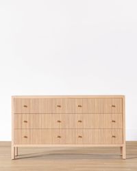 Enveloping your space with an airy feel, our Kendall Oak Dresser is all about the details, from the fluted drawer fronts to brass handle pulls. With innovative soft close drawers, this dresser is the epitome of function and beauty with its large storage design.