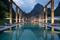 Set in a 1960s sugar mill, on the Lijiang River and admist spectacular karst mountain scenery, Alila Yangshuo is a luxury design hotel offering an extensive spa, indoor and outdoor pools, bar, restaurant and industrial chic rooms.