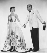 Audrey Hepburn wearing a red carpet-worthy Givenchy dress