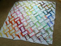Pre-sew white strip onto colored fabric and then piece together for signature quilt guest book