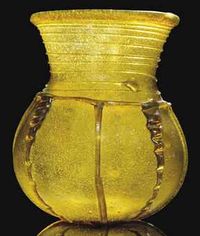 Anglo-Saxon amber glass beaker, ca. 7c