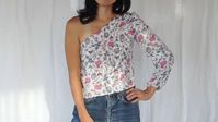 Including neckline facing, adjustable waist tie and elastic tunnel puff sleeve cuff, these three design elements make up the Abelia top. Follow the blueprint for better results and fit without issue. Easy sewing tutorial!