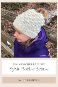 The pattern was written by Esther's Hands in standard US terms. This pattern is a perfect choice for crocheters at all levels! The slouchy beanie is seamless, and it has a beautiful texture. * * * The Sylvia Bobble Beanie is the perfect match to the Sylvia Bobble Dress! You can purchase the set as well. Sizes: 0-6 month, 6-12 month, 1-2 year, 3-10 year Designed in DK weight (3) yarn and requires 4.25 mm (G) crochet hook.