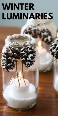 Make pretty winter luminaries that appear to be covered with freshly fallen snow using snow texture paint! Oh so gorgeous and perfect for the holidays, they are very easy to make. #winterdecor #luminaries #masonjarcrafts #masonjars #winterhomedecor #christmasdecor #christmascenterpiece #centerpiece #craftsbyamanda