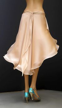 Belled skirt, looks nice and flowy. Chiffon over a lining, perfect for tango.